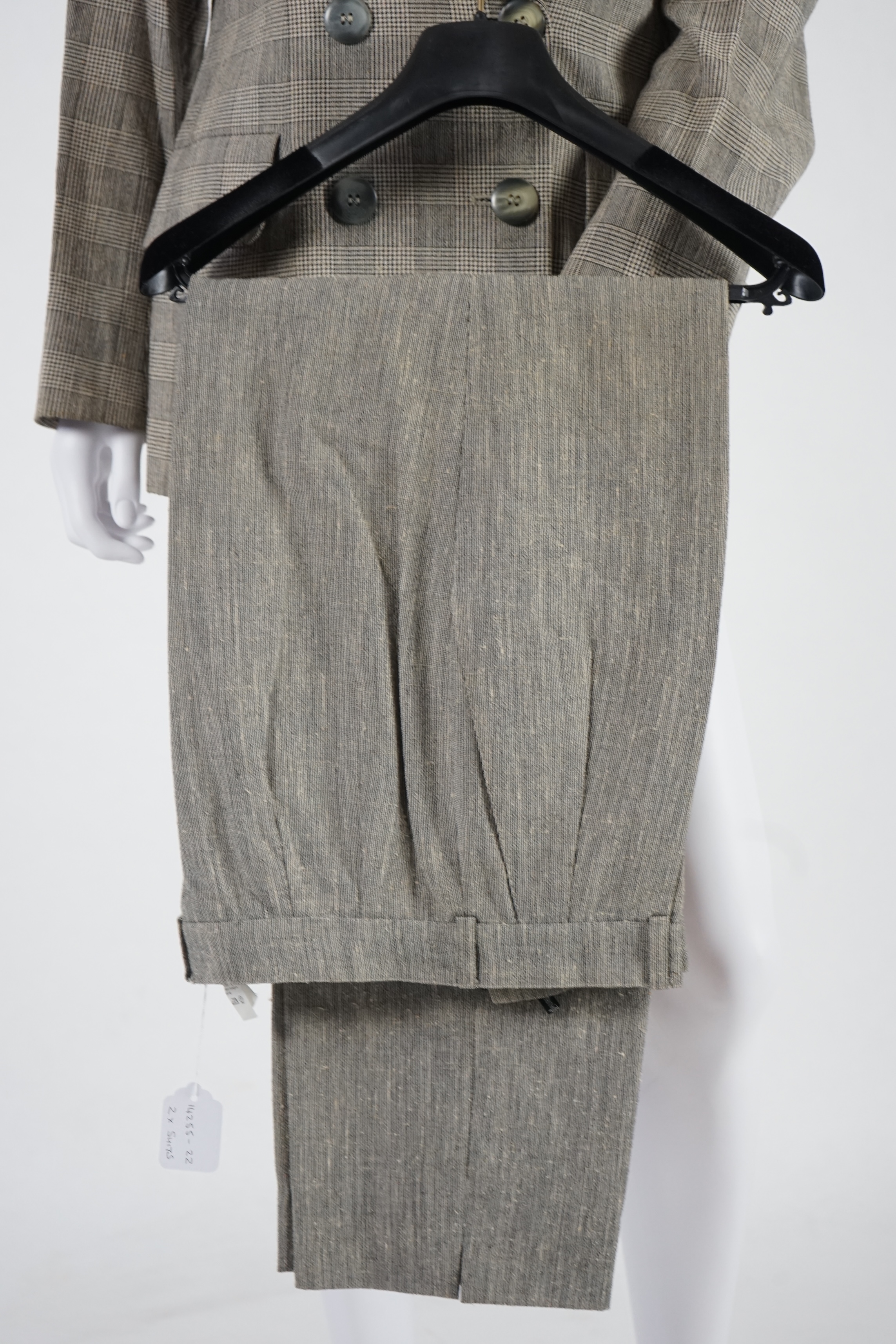 Two vintage Yves Saint Laurent variation lady's trouser suits, F 40 (UK 12). Please note alterations to make the waist smaller may have been carried out on some of the skirts. Proceeds to Happy Paws Puppy Rescue.